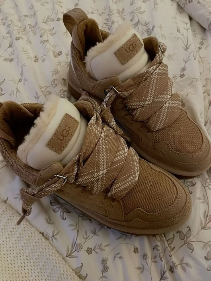 Chestnut Lowmels with the plaid laces worn loose.